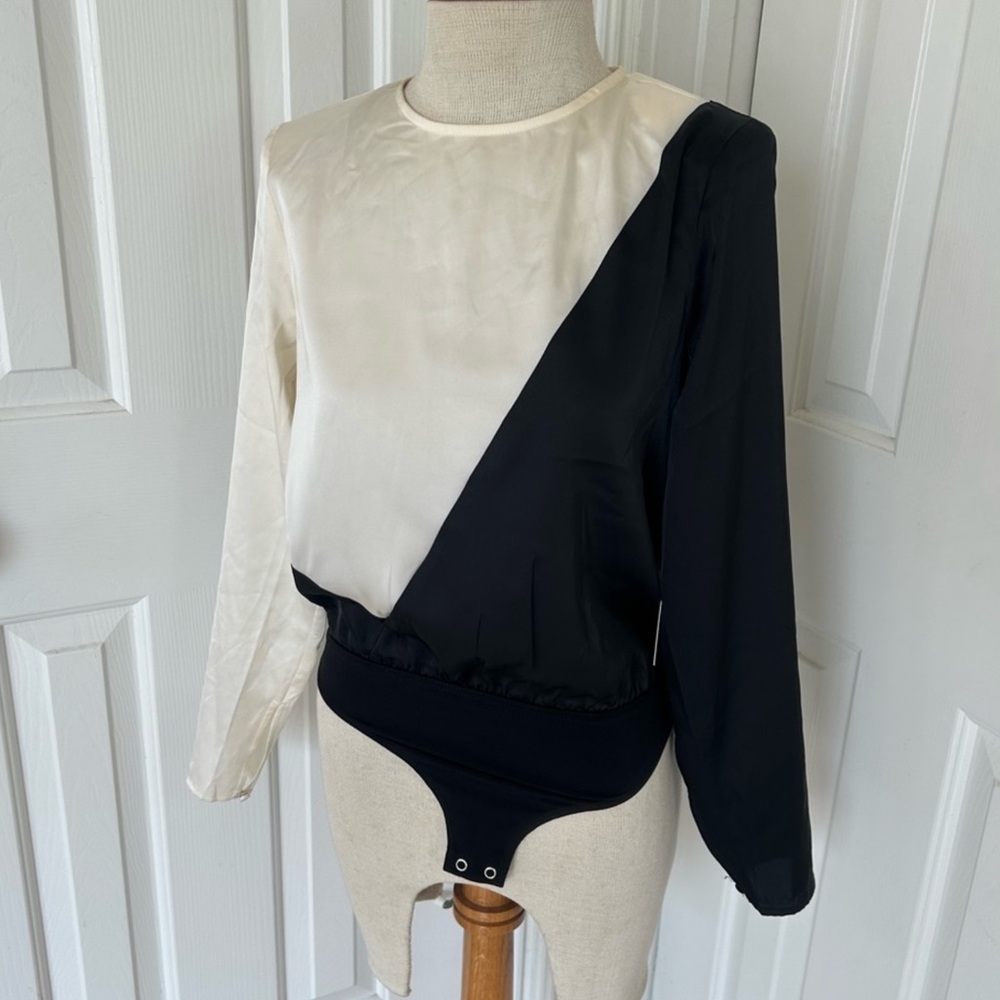 Express black & white asymmetrical long sleeve bodysuit, size XS, NWOT